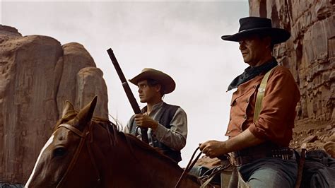 The Searchers! A Timeless Saga of Revenge and Redemption Across the Rugged American Frontier!